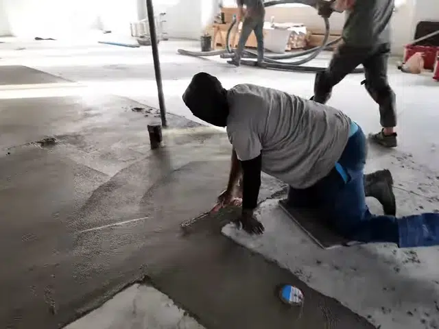 Commercial plumbing work area with open space, piping, and building materials related to Commercial backflow device in Monrovia