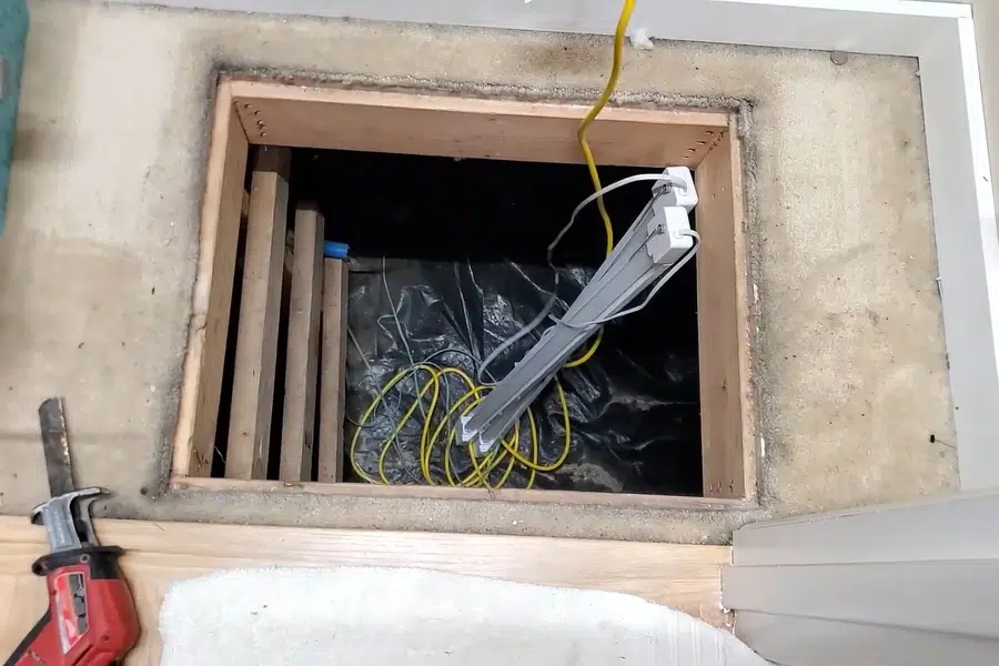 Crawlspace plumbing with drain and supply lines below the floor related to Drain camera inspection in Monrovia