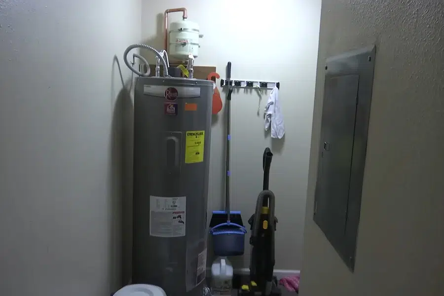 Tank water heater with nearby valves, venting, and supply connections related to Monrovia Canyon Park above North Monrovia
