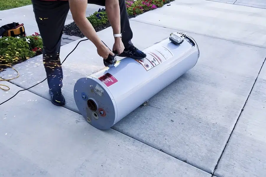 Tank water heater with nearby valves, venting, and supply connections related to Descaling a tankless heater in Monrovia