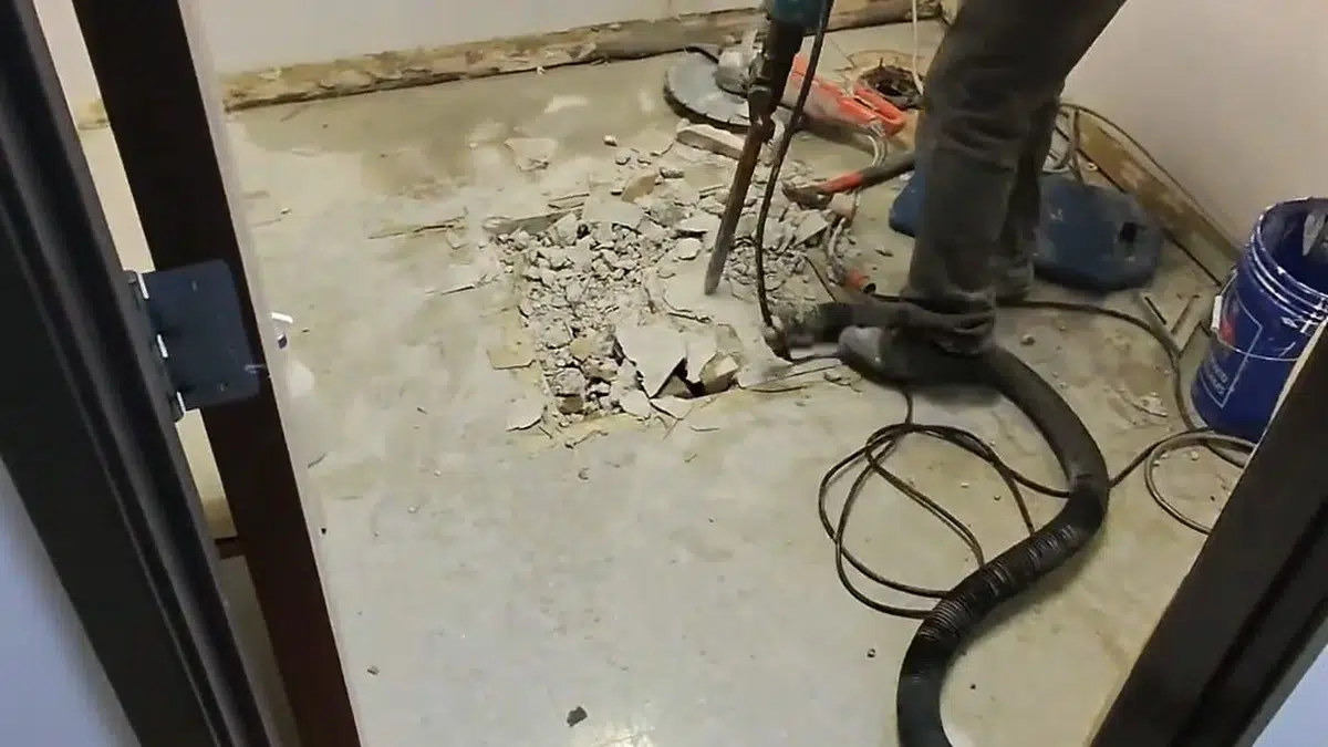 Drain cleaning cable and hand tools used to clear a blocked sink drain in Monrovia