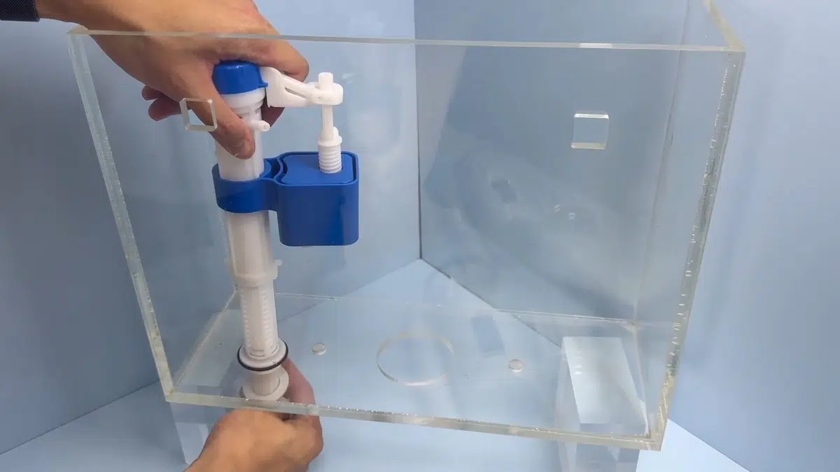 Toilet tank repair parts with fill valve and flapper components related to Toilet installation in a Monrovia home