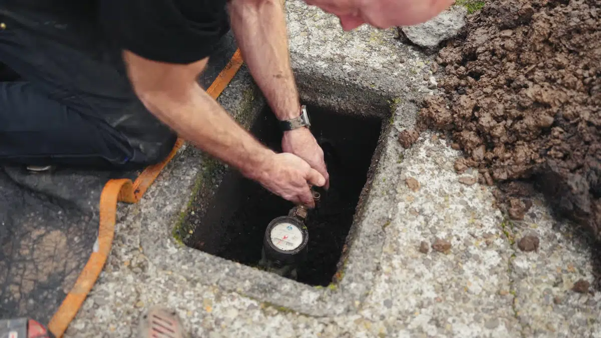 Excavated pipe repair area with exposed underground plumbing related to Sewer line camera inspection in Monrovia