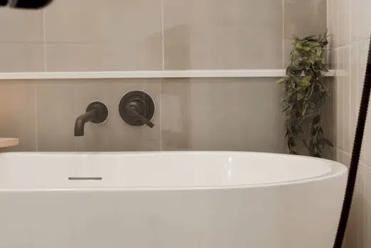 Finished bathroom shower and bathtub fixtures with clean tile surfaces related to South Pasadena CA neighborhood