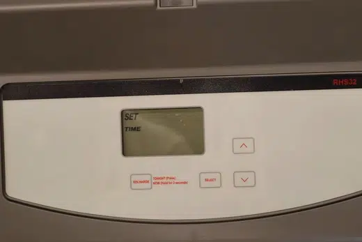 Whole-house water softener with control valve and resin tank related to Tankless Heaters and Hard Water, Monrovia plumbing guide